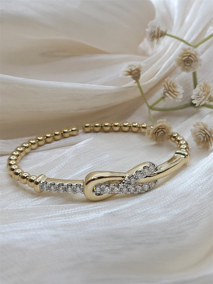 14K Yellow Gold Bujukan Diamond Interlock Split Bangle Bracelet