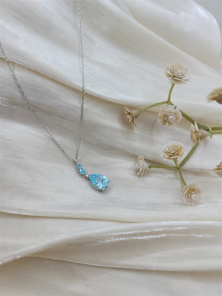 Sterling Silver Lab Grown Blue Topaz & Swarovski Crystal Necklace