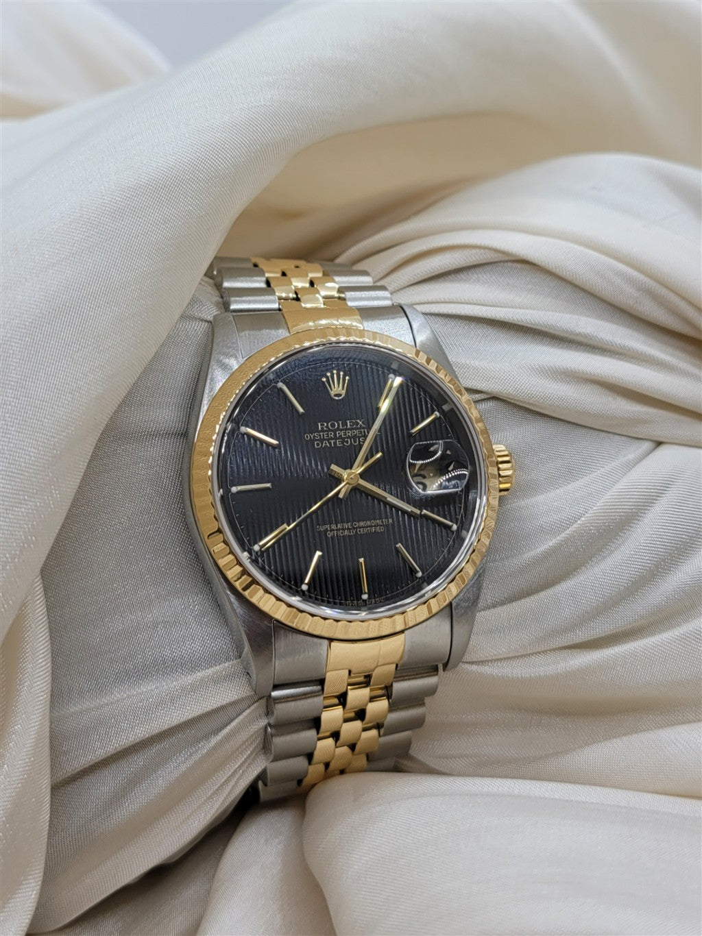 Stainless & 18K Yellow Gold Black Tapestry Dial Datejust Perviously Owned Rolex