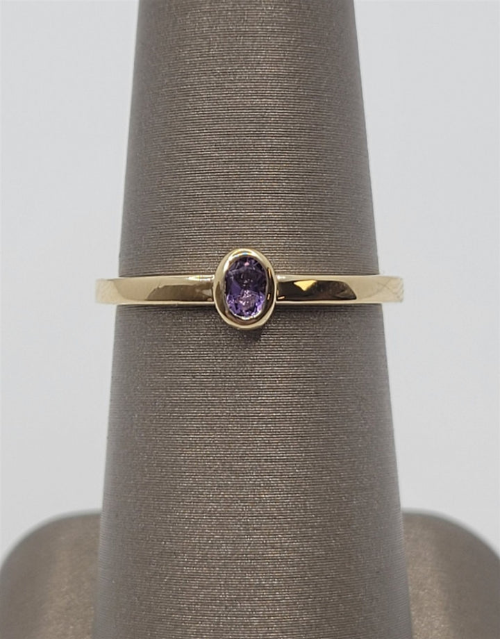 14K Yellow 4X3mm Oval Solitaire Bezel Set Amethyst Ring