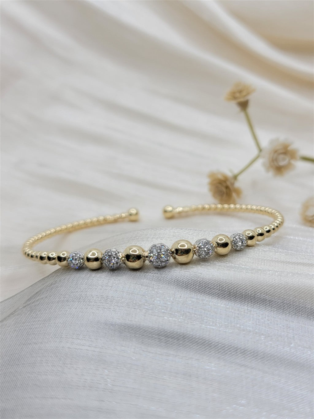 14K Two-Tone Gold "Gabriel & Co." Bujukan Tapered Bead Diamond Bangle Bracelet