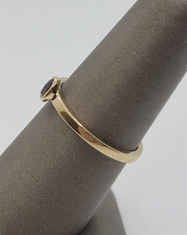 14K Yellow 4X3mm Oval Solitaire Bezel Set Amethyst Ring