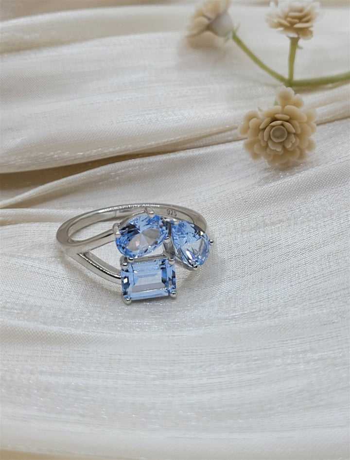 Sterling Silver Lab Grown Blue Topaz 3-Stone Ring
