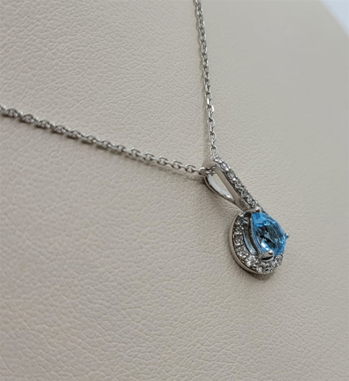 10K White Gold Blue Topaz & Diamond Halo Pendant