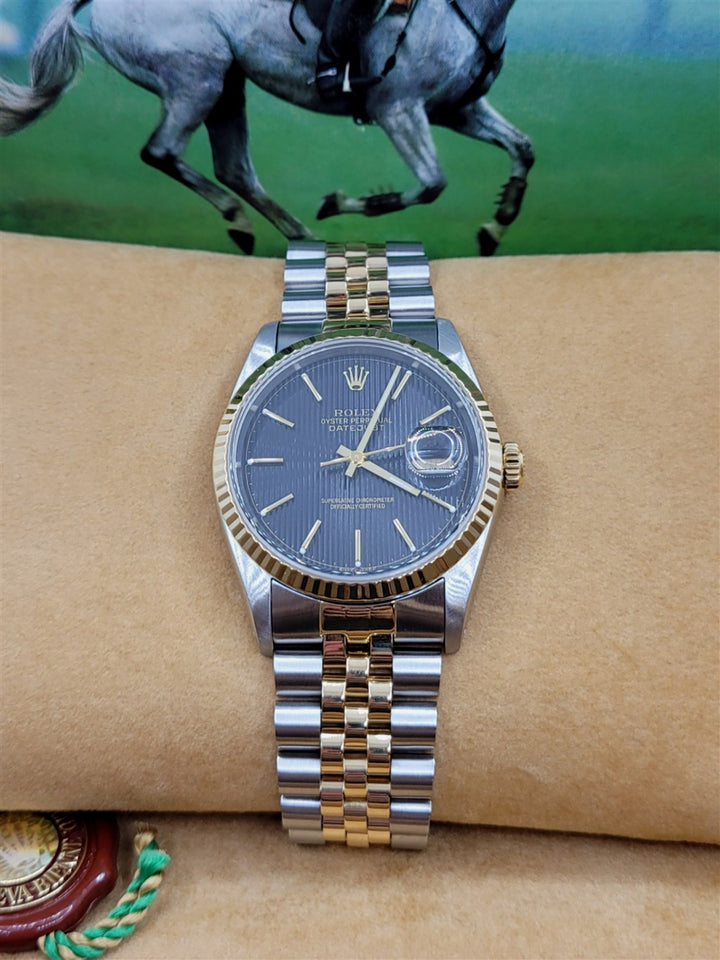 Stainless & 18K Yellow Gold Black Tapestry Dial Datejust Perviously Owned Rolex