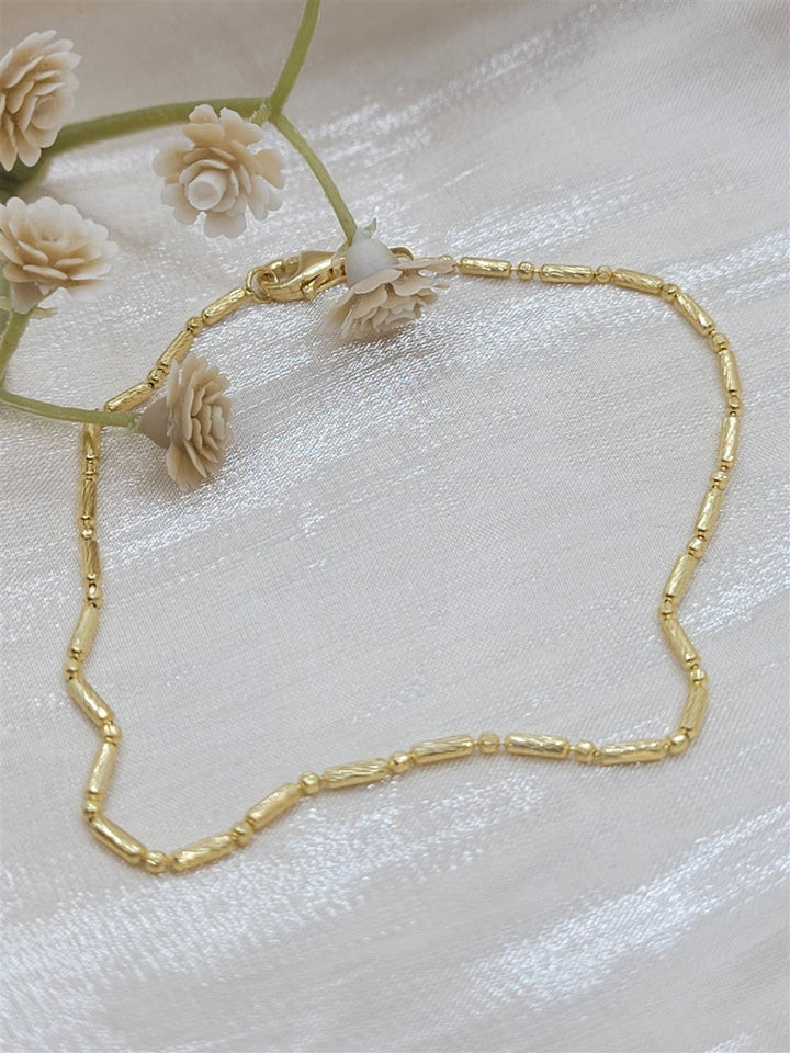 7.25" 14K Yellow Gold Bead And Long Bar Bracelet